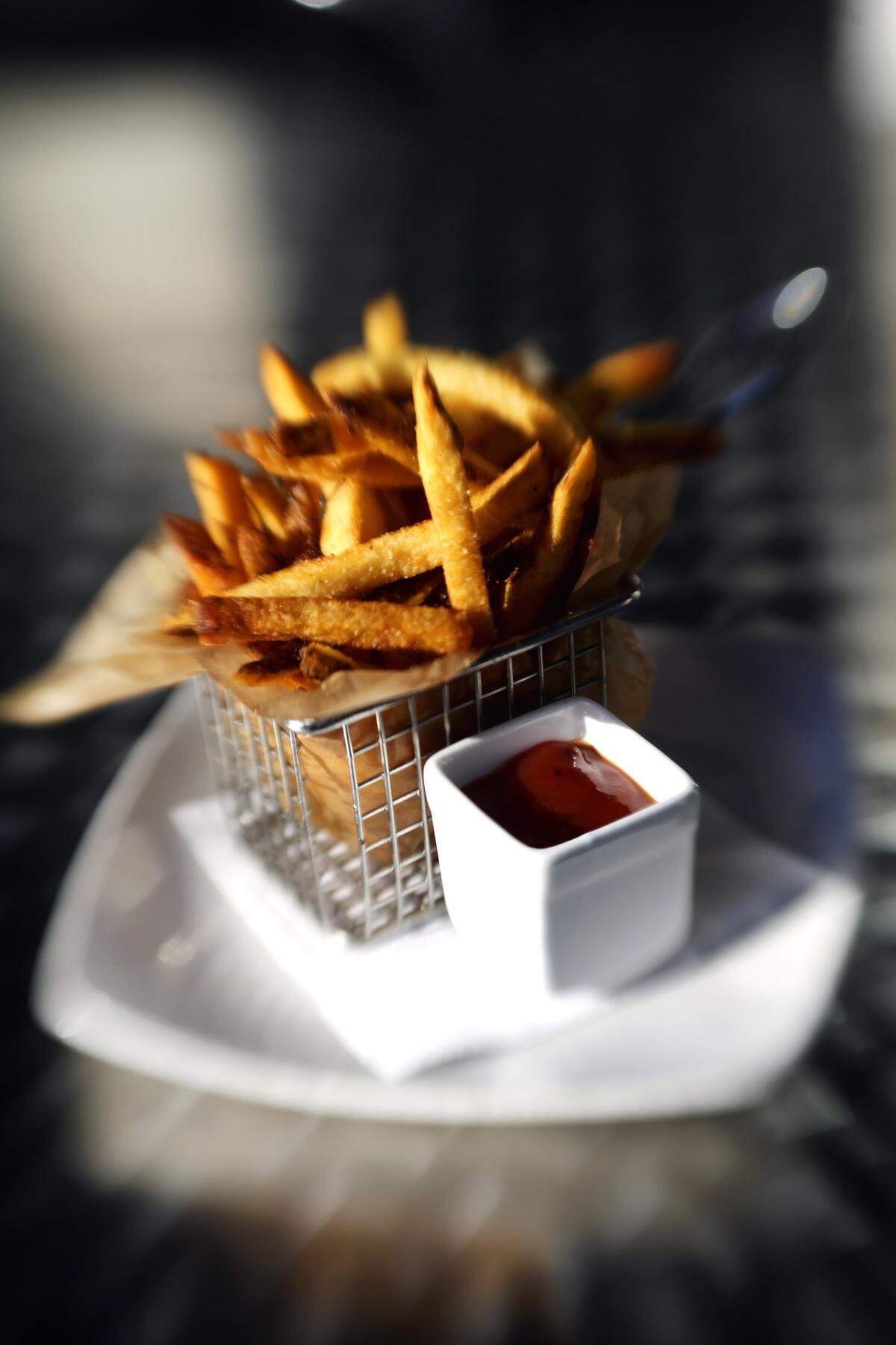 The popular house-cut fries also will be back on the new menu, which will include fewer entrees and more hand-held items for quicker and more streamlined service.