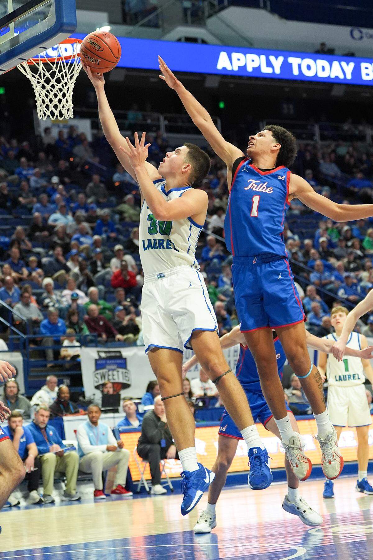 North Laurel forward Reece Davidson takes a shot against Montgomery County during their Boys’ Sweet 16 game Friday.