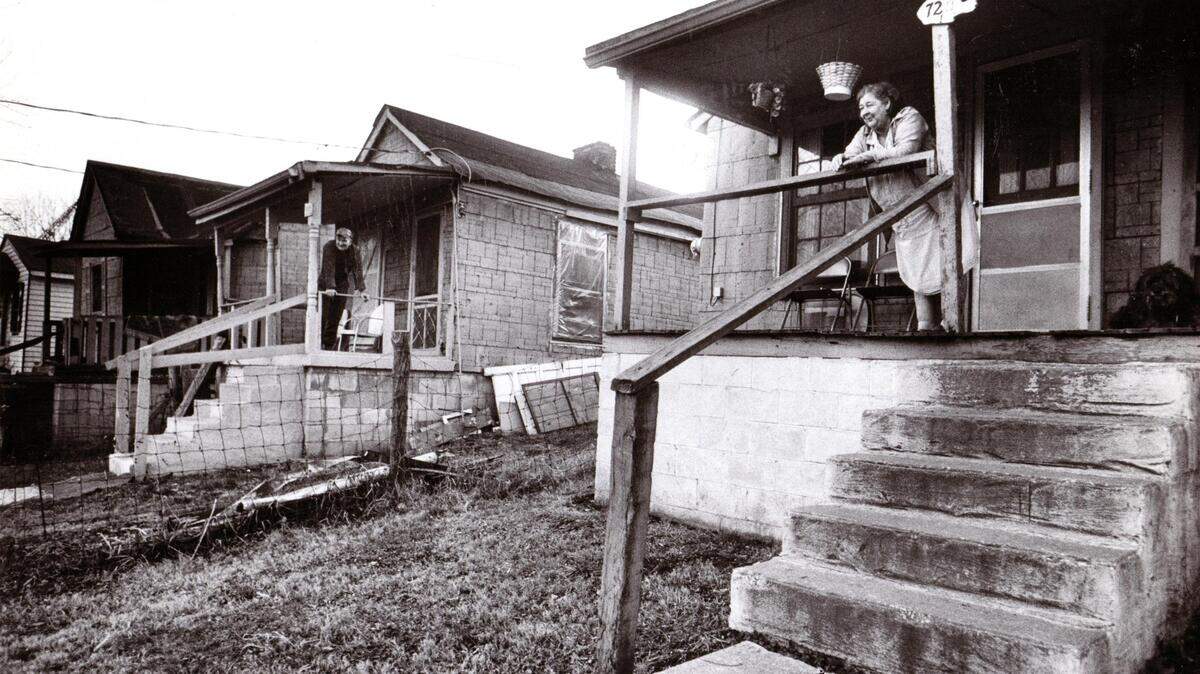 Bill  Huddleston, left, and his sister Elizabeth Wardle lived next door to each other in Davis Bottom in 1980. At the time, their rent was $85 a month in the low-income community tucked between South Broadway and West High Street. In 2006, 29 homes were torn down.