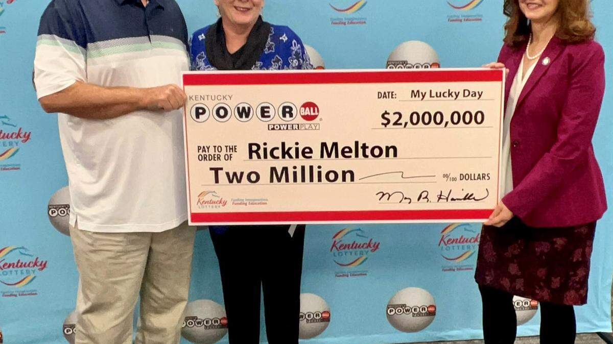 Pictured: Rickie and Karen Melton, a married couple from Marshall County, pose with their lottery earnings made out via $2 million check. The two are among the latest Powerball winners from the game’s Oct. 29 drawing. 