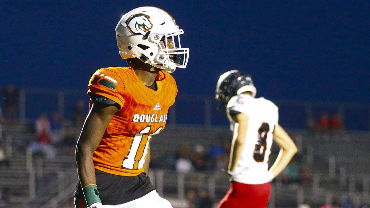 Frederick Douglass star Dekel Crowdus (left) was named to Sports Illustrated’s All-American watch list for the 2020 season.