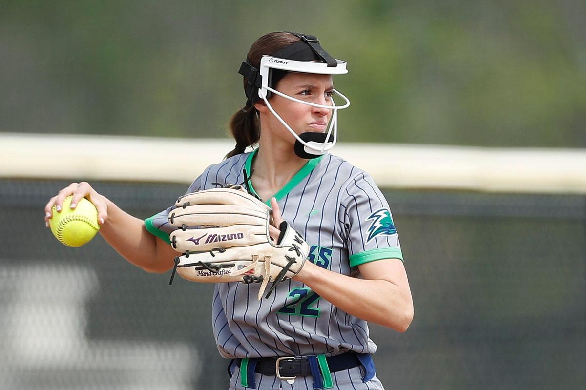 Great Crossing’s Camryn Lookadoo looks to throw the ball after a play at third base against Henderson County on April 30.
