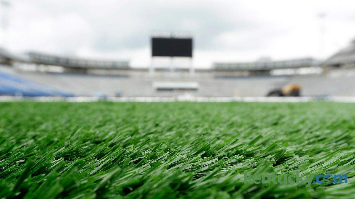 Installation of artificial turf began at University of Kentucky's Commonwealth Stadium in Lexington, Ky., on May 28, 2015. The installation process will take approximately four weeks and will include blue checkered turf on the end zones. Photo by Pablo Alcala | Staff
