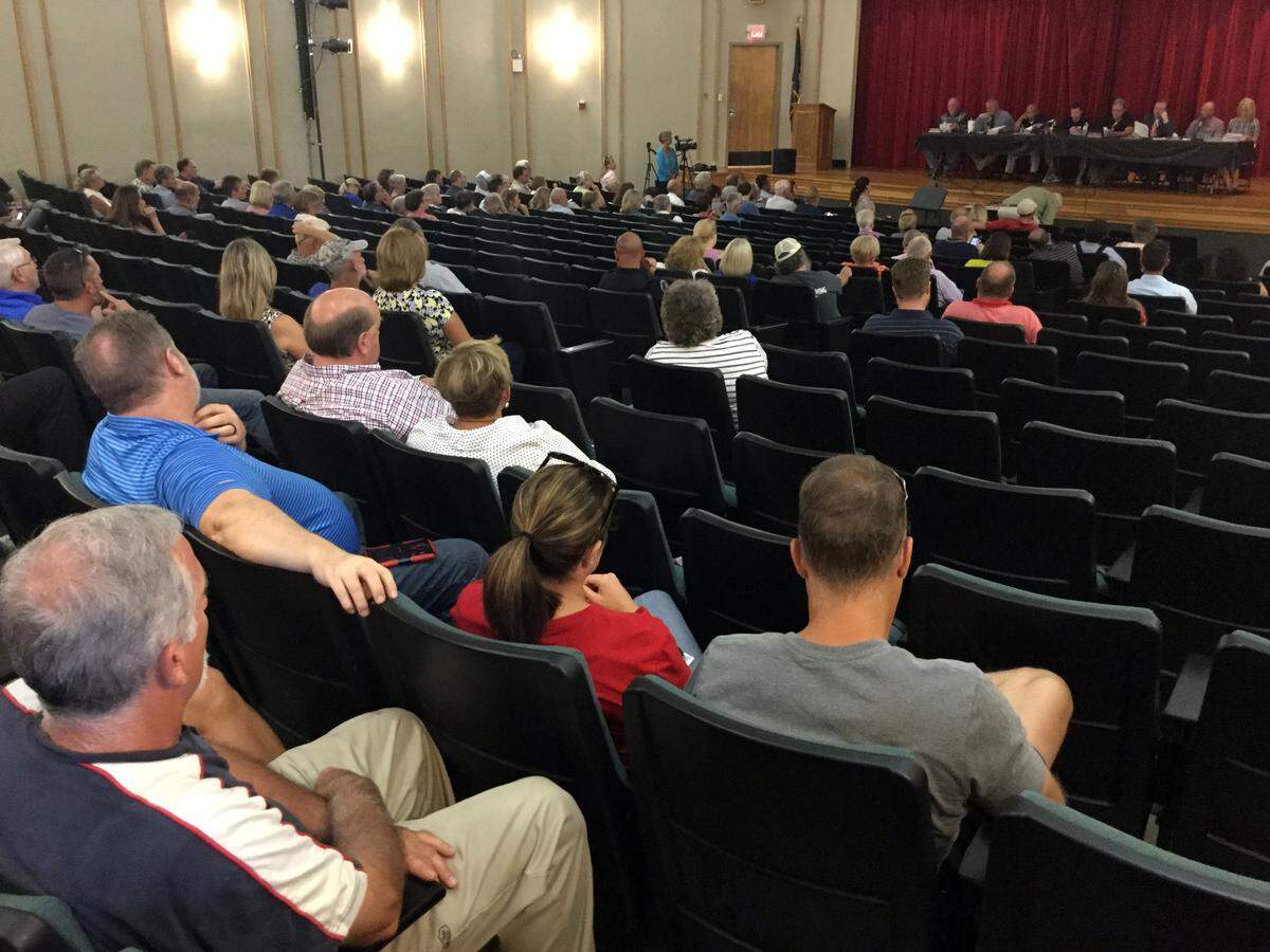 About 160 people attended a Paris City Commission meeting at a high school auditorium to hear discussion on a failing golf course that’s on a fast track to be rezoned for light industrial uses.
