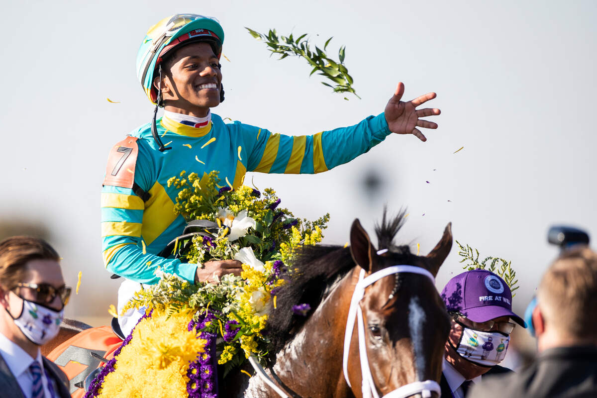Fire at Will, with Ricardo Santana Jr. up, celebrates after winning the Juvenile Turf race during the first day of the Breeder’s Cup World Championships at Keeneland in Lexington, Ky., Friday, November 6, 2020.