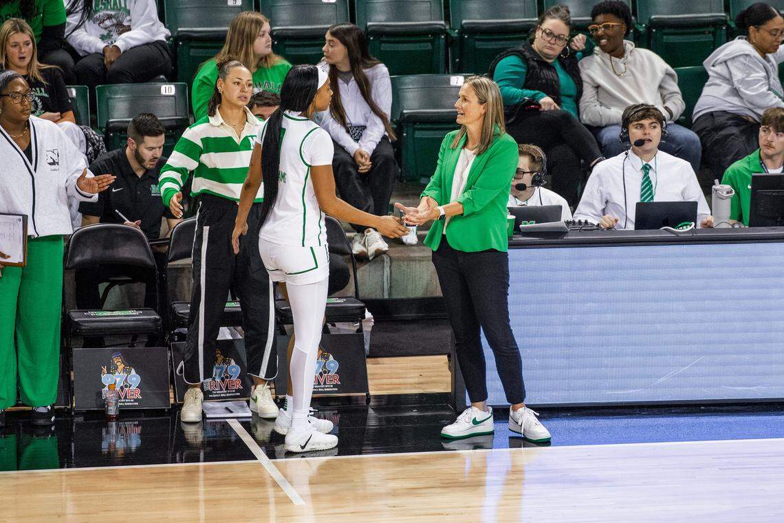 Former Transylvania coach Juli Fulks, right, has Marshall off to a 2-1 start in 2025-26, including a 15-point win over Northern Kentucky and a six-point loss at Indiana.