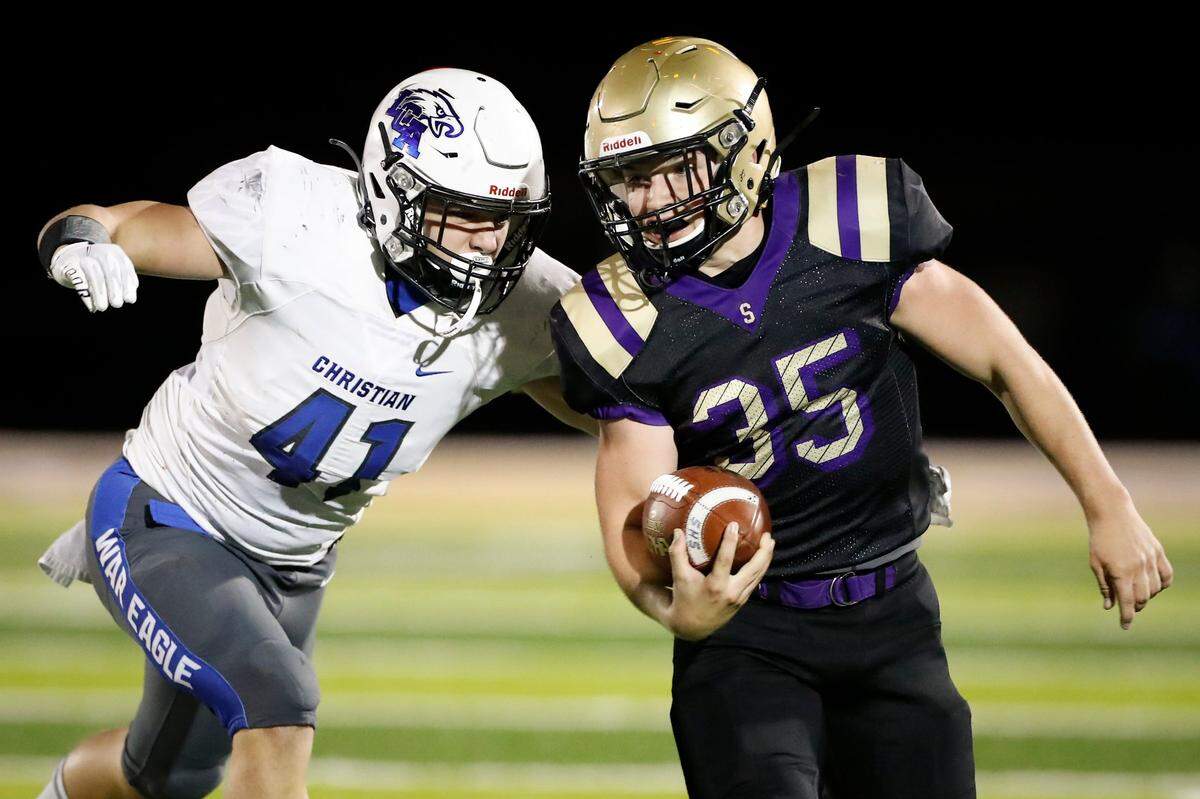 Lexington Christian’s Matty Lebryk (41) tracked down Somerset’s Guy Bailey (35) during a game in October.