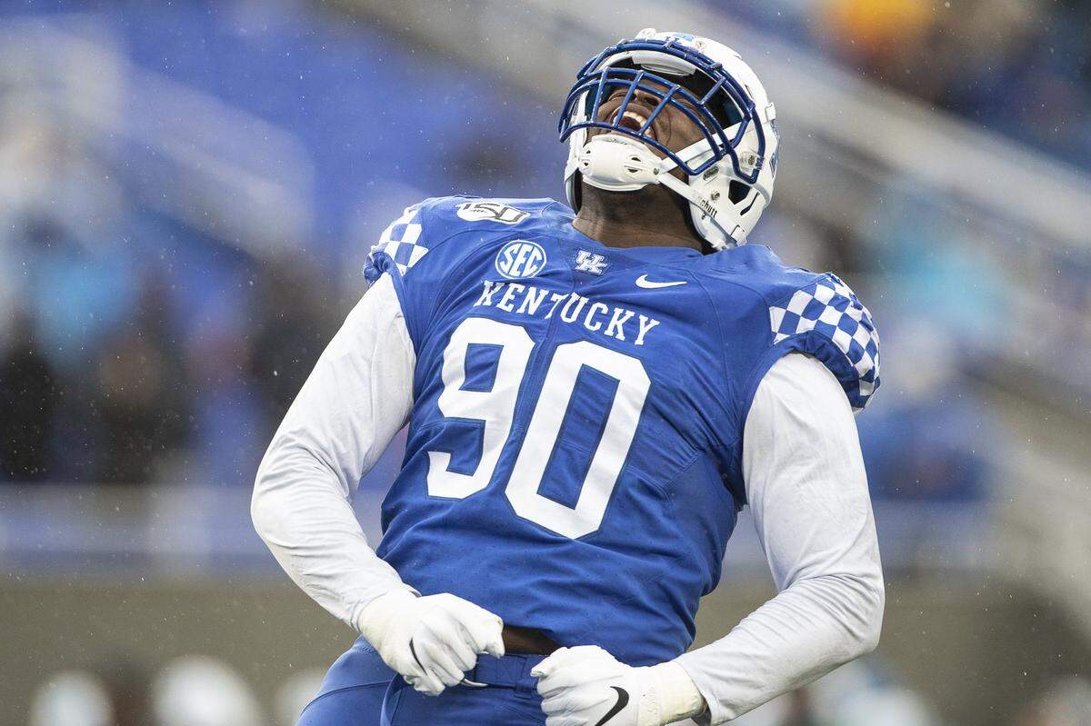 Kentucky senior defensive end T.J. Carter (90) celebrated a quarterback sack during last week’s 50-7 win over Tennessee Martin. Carter has four tackles for loss and two sacks this season.