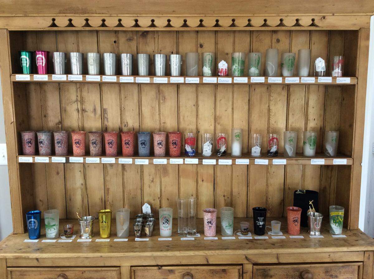About 500 Derby glasses, including mint julep cups, shot glasses and other barware, will be auctioned by Caswell Prewitt.