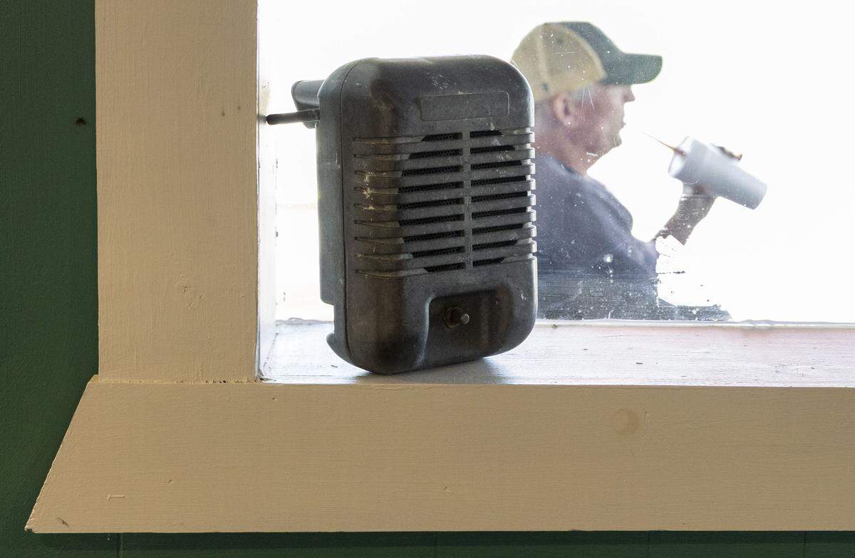 A vintage car speaker used when the Mountain View Drive-In was open sits on a window sill of the Drive-In Diner. 