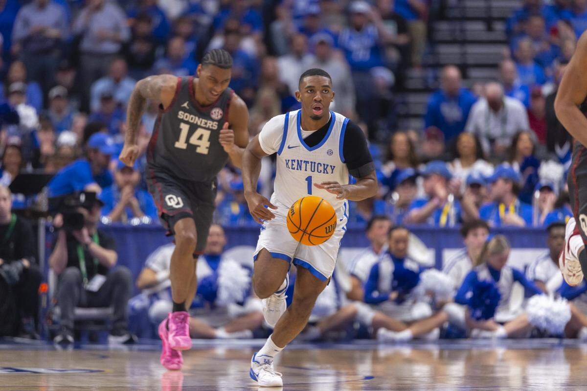 Kentucky guard Lamont Butler (1) drives as Oklahoma forward Jalon Moore (14) defends during Thursday night’s game at Bridgestone Arena in Nashville, Tennessee.
