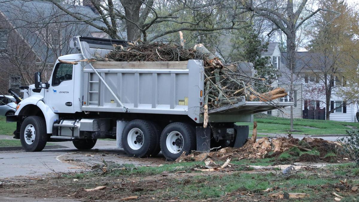 City of Lexington truck prepares to hall a load of storm debris from a downed trees on Louisiana Ave April 3, 2024.