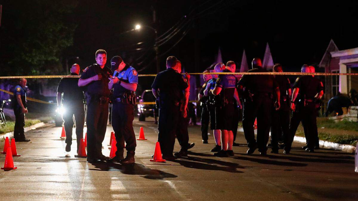 Lexington police investigate the scene of a shooting near the intersection of East Sixth Street and Chestnut Street in Lexington, Ky., Thursday, May 27, 2021.