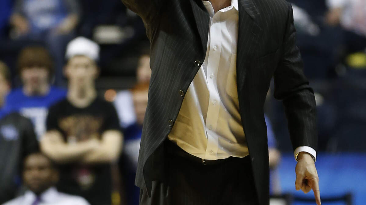 Kentucky Wildcats head coach John Calipari yelled instructions to his team as Kentucky played Vanderbilt  on Friday March 15, 2013 in Nashville,TN. Photo by Mark Cornelison | Staff
