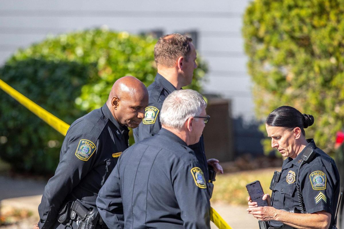 Members of the Lexington Police Department, including Chief Lawrence Weathers, left, respond to the report of a shooting in an apartment complex along North Locust Hill Drive in Lexington, Ky., on Friday, Oct. 28, 2022.