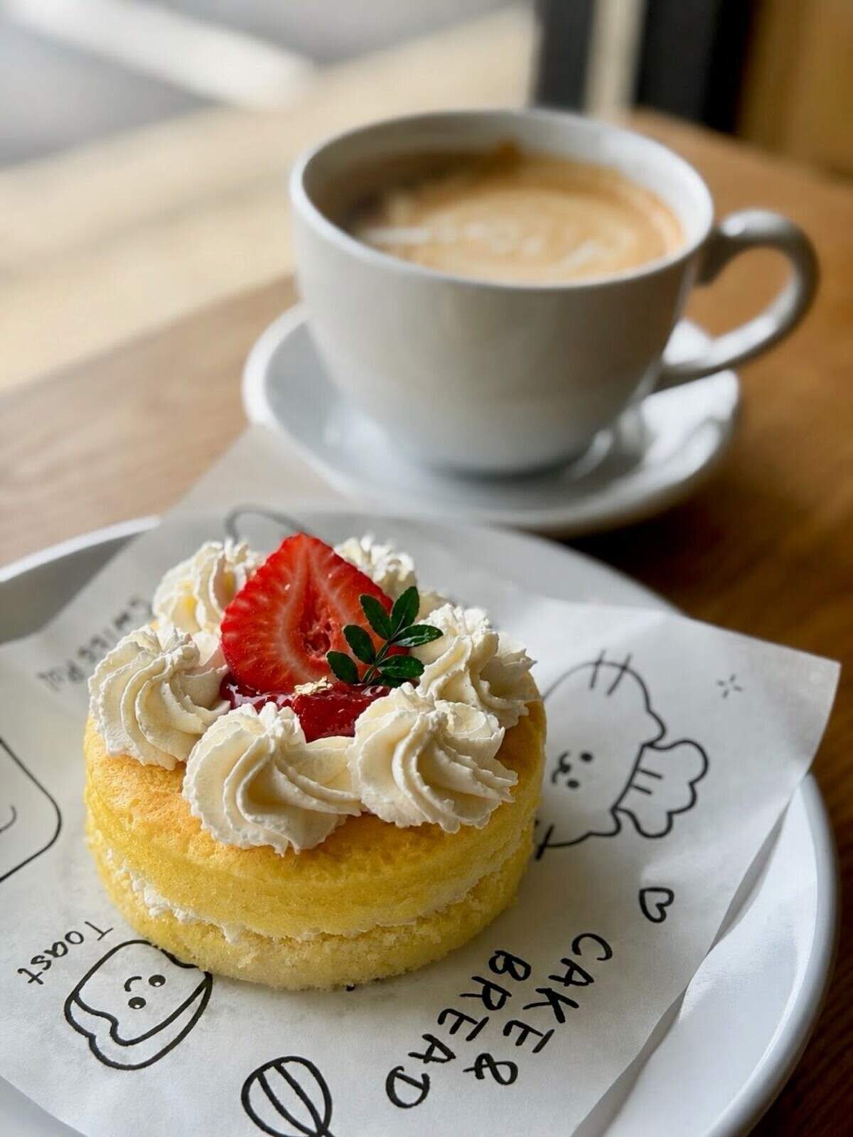 Sweet Cottage Asian Bakery Cafe offers a variety of baked treats such a light sponge cake with fresh whipped cream and strawberries, made Asian-style, a slightly less sweet baking style, according to the owners.