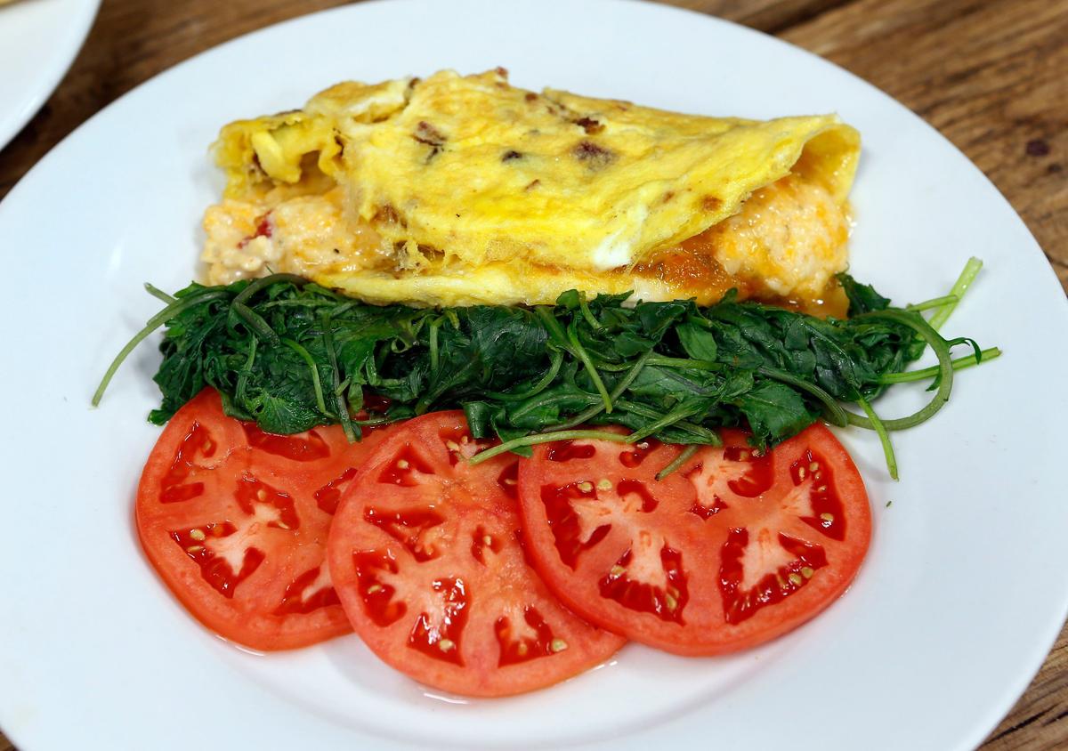 The Hayden’s Omelette served for breakfast at Hayden’s Stockyard Eatery, 4561 Ironworks Pike. It includes three Chelsey eggs filled with Benton’s bacon, house made pimento cheese and jalape–o peach jam.
