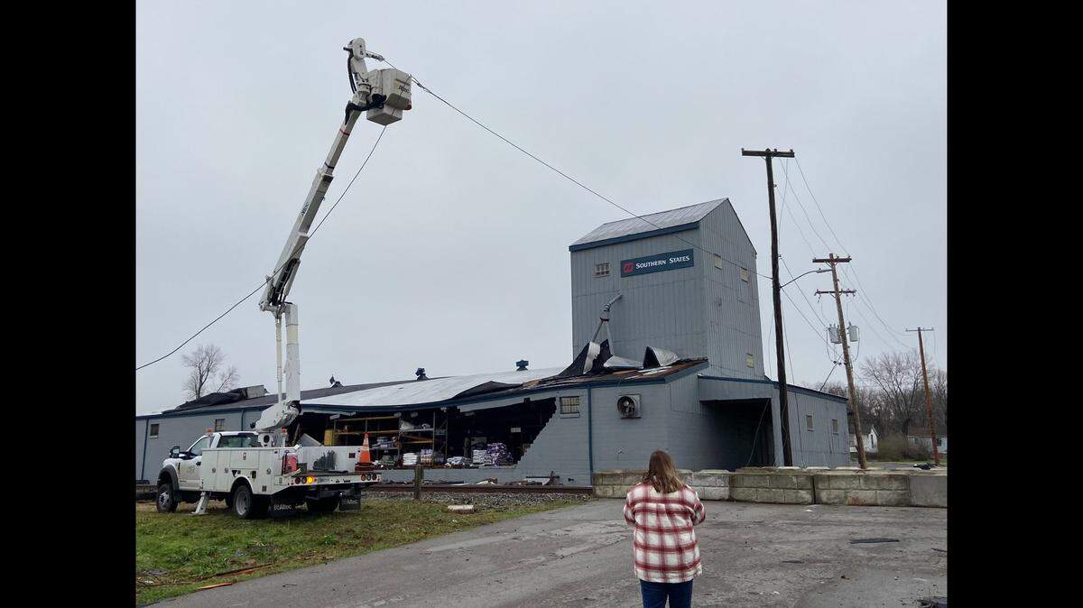 The National Weather Service surveys damage from New Year’s Day tornadoes in Western Kentucky on Sunday, Jan. 2, 2022.