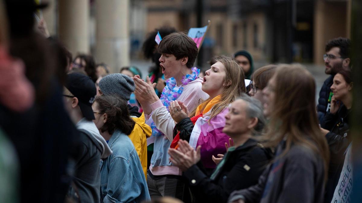 People gathered for a rally organized by LGBTQ youth and adults in opposition to Senate Bill 150 and also to celebrate Trans Day of Visibility in Lexington, Ky., Friday, March 31, 2022.