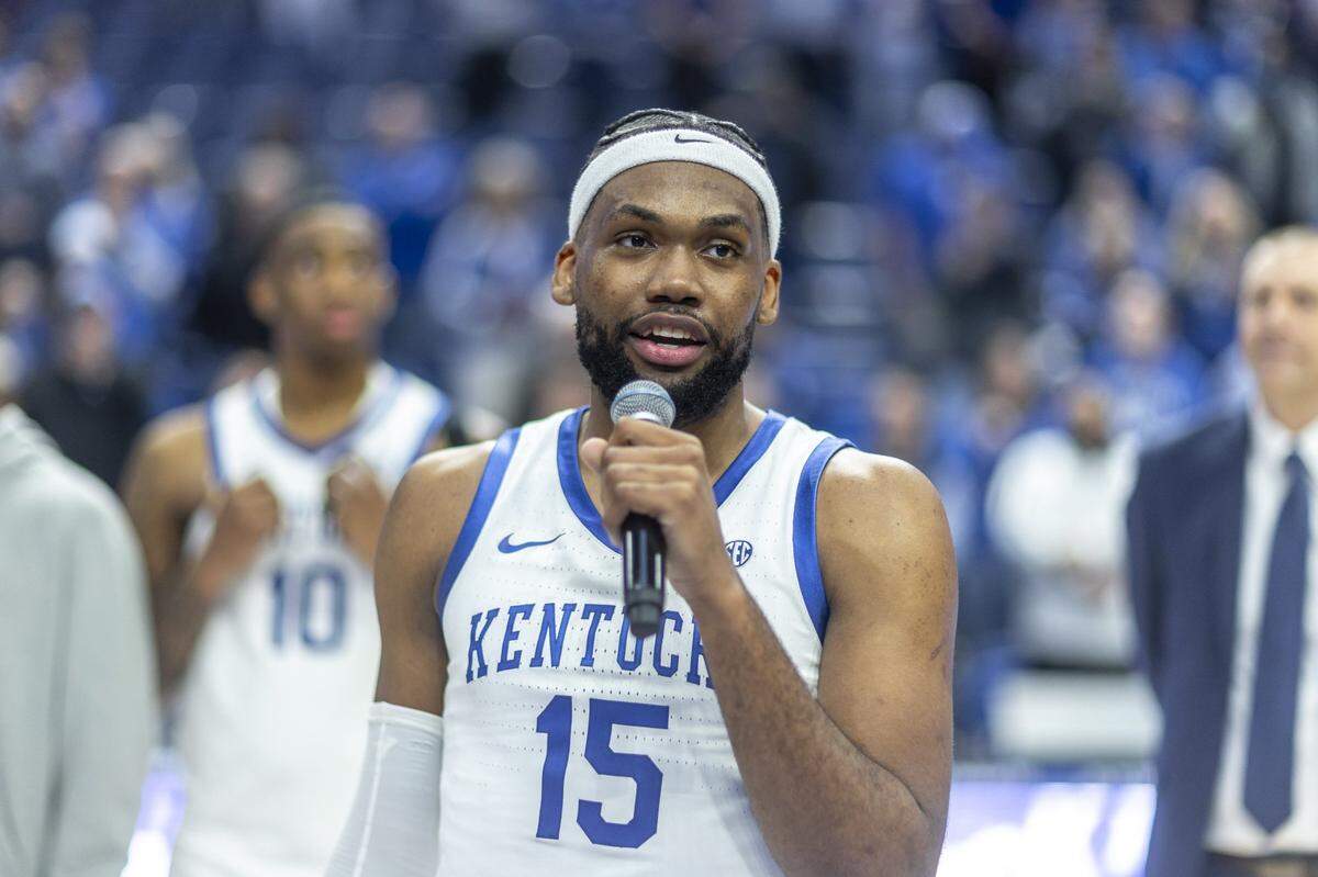 Kentucky forward Ansley Almonor (15) talks to the crowd following Tuesday’s game against LSU at Rupp Arena.