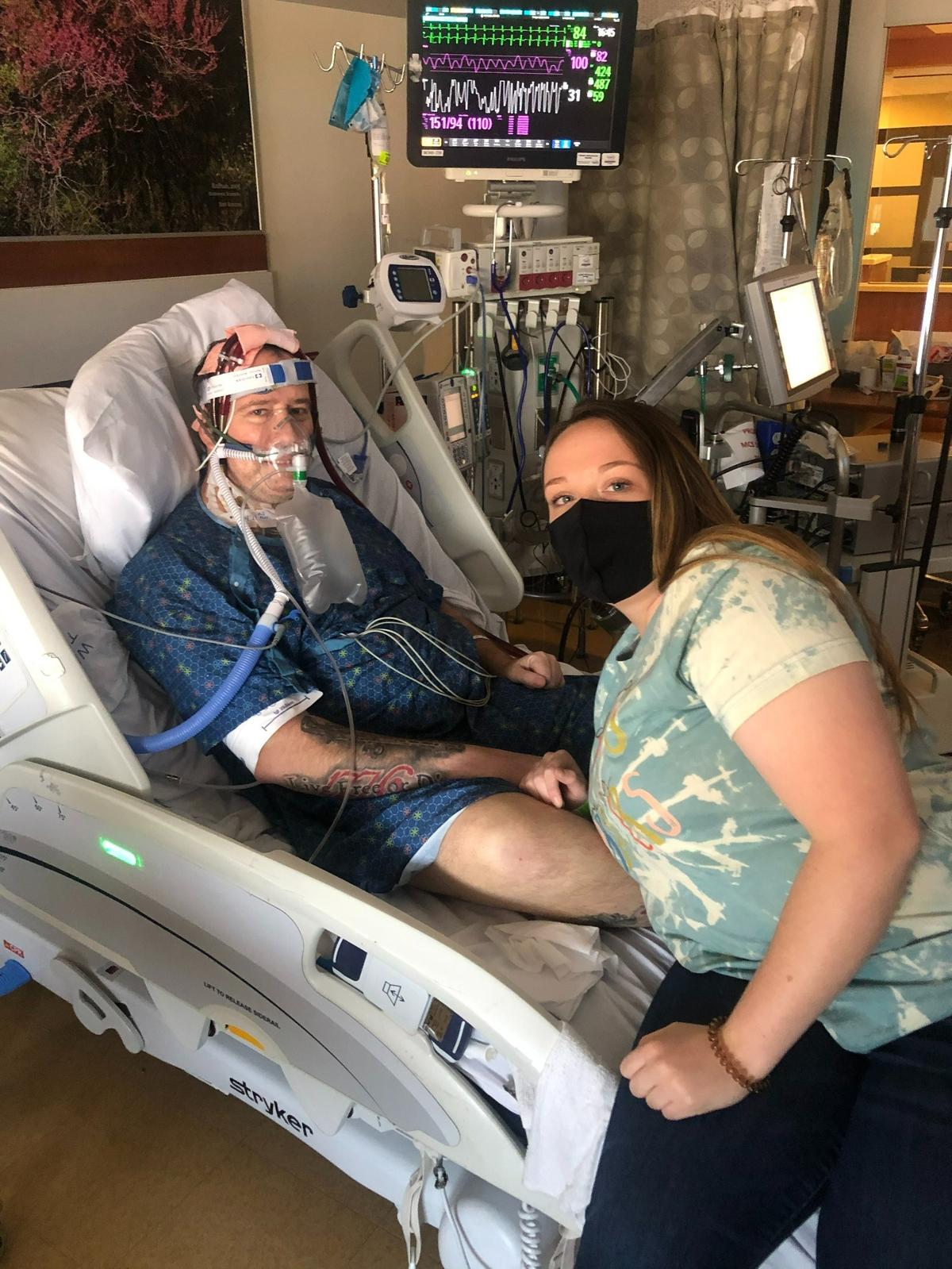 Dave Hoover, 43, in the hospital. He is the first Kentuckian to get a double lung transplant from complications related to COVID-19.