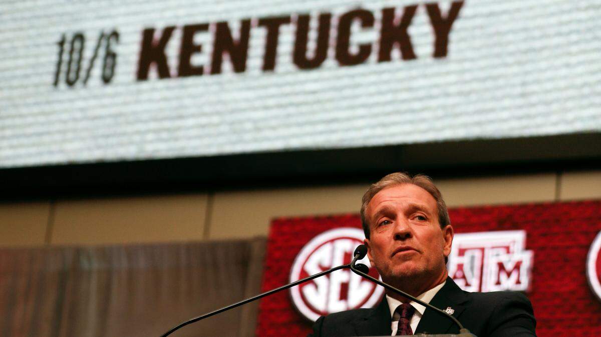 New Texas A&M head coach Jimbo Fisher spoke during SEC Media Days in Atlanta on Monday with the Aggies’ 2018 football schedule displayed behind him. A&M’s game against Kentucky on Oct. 6 represents a coaching reunion for Mark Stoops and Fisher.