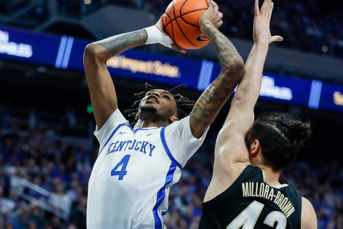Kentucky Wildcats forward Daimion Collins (4) drives to the basket against Vanderbilt Commodores forward Quentin Millora-Brown (42) during the game at Rupp Arena in Lexington, Ky., Wednesday, March 1, 2023.