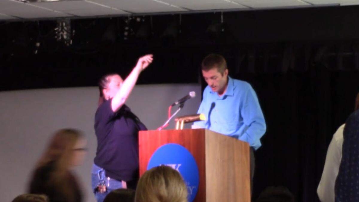 A University of Kentucky employee directed another employee to cut the power to a microphone used in September 2014 by U.S. Senate write-in candidate Robert Ransdell of Florence. Ransdell made racist remarks at a Constitution Day event Wednesday at UK.