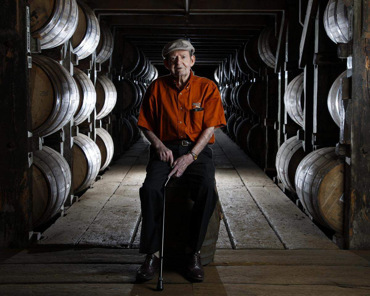 Elmer T. Lee, master distiller emeritus at Buffalo Trace, poses for a portrait in May 2013. He’s considered the innovator of premium bourbon. 