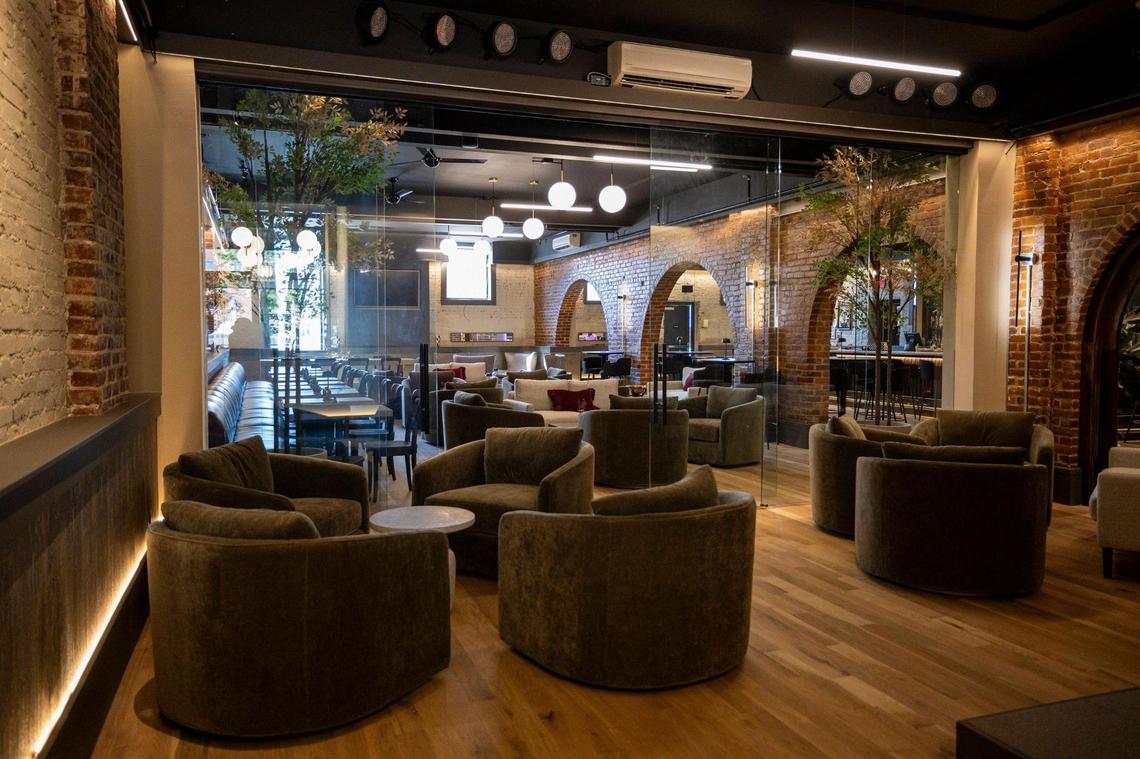 Private seating area, with glass dividers, at The Melroy on Thursday, July 3, 2025, at 144 N. Broadway in Lexington, Ky.