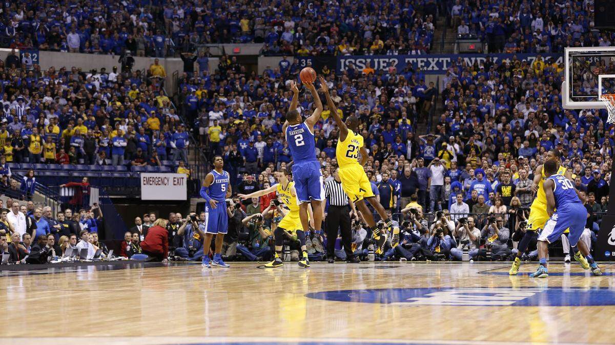 Aaron Harrison’s game-winning three-point shot against Michigan in the 2014 NCAA Tournament Midwest Region finals gave Kentucky a 75-72 win and a berth in the Final Four.