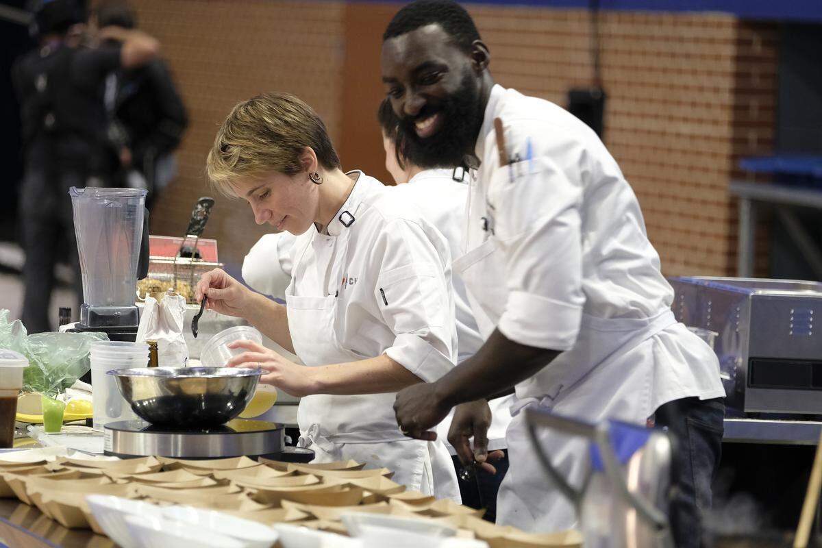 On the winning team, Adrienne Wright and Eric Adjepong. Eric gets the win for his elevated “chicken wing.”