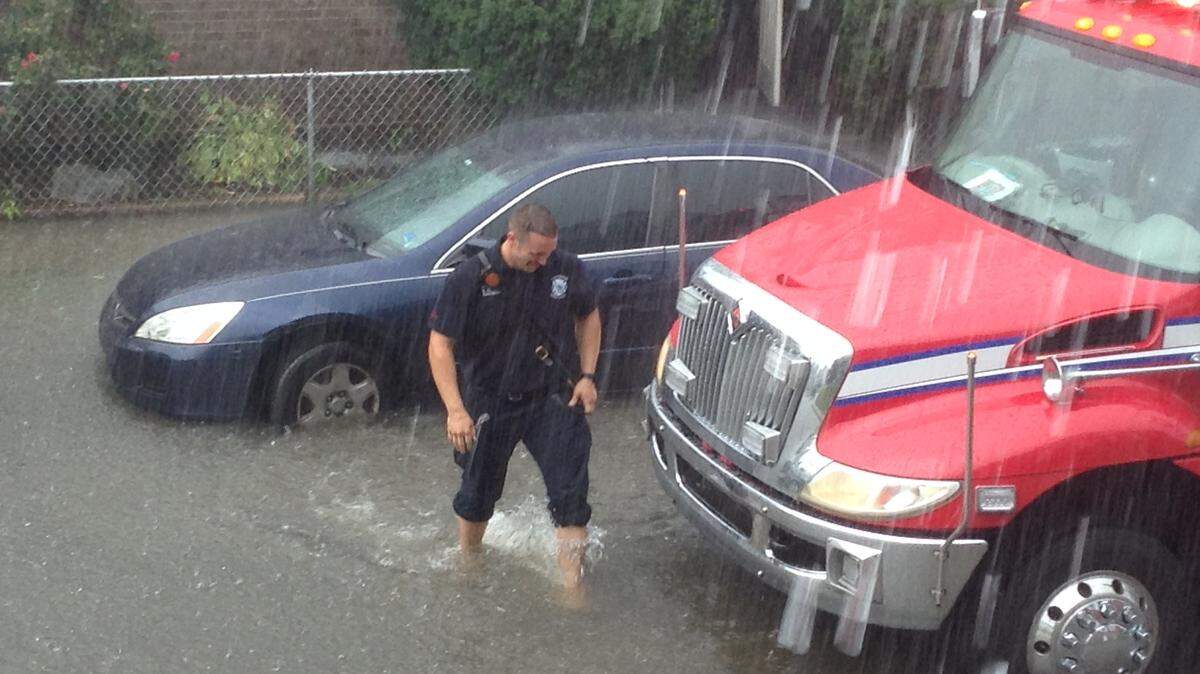 During recent flooding on Ohio Street, paramedics had to wade in ankle deep water in order to attend to a medical emergency.