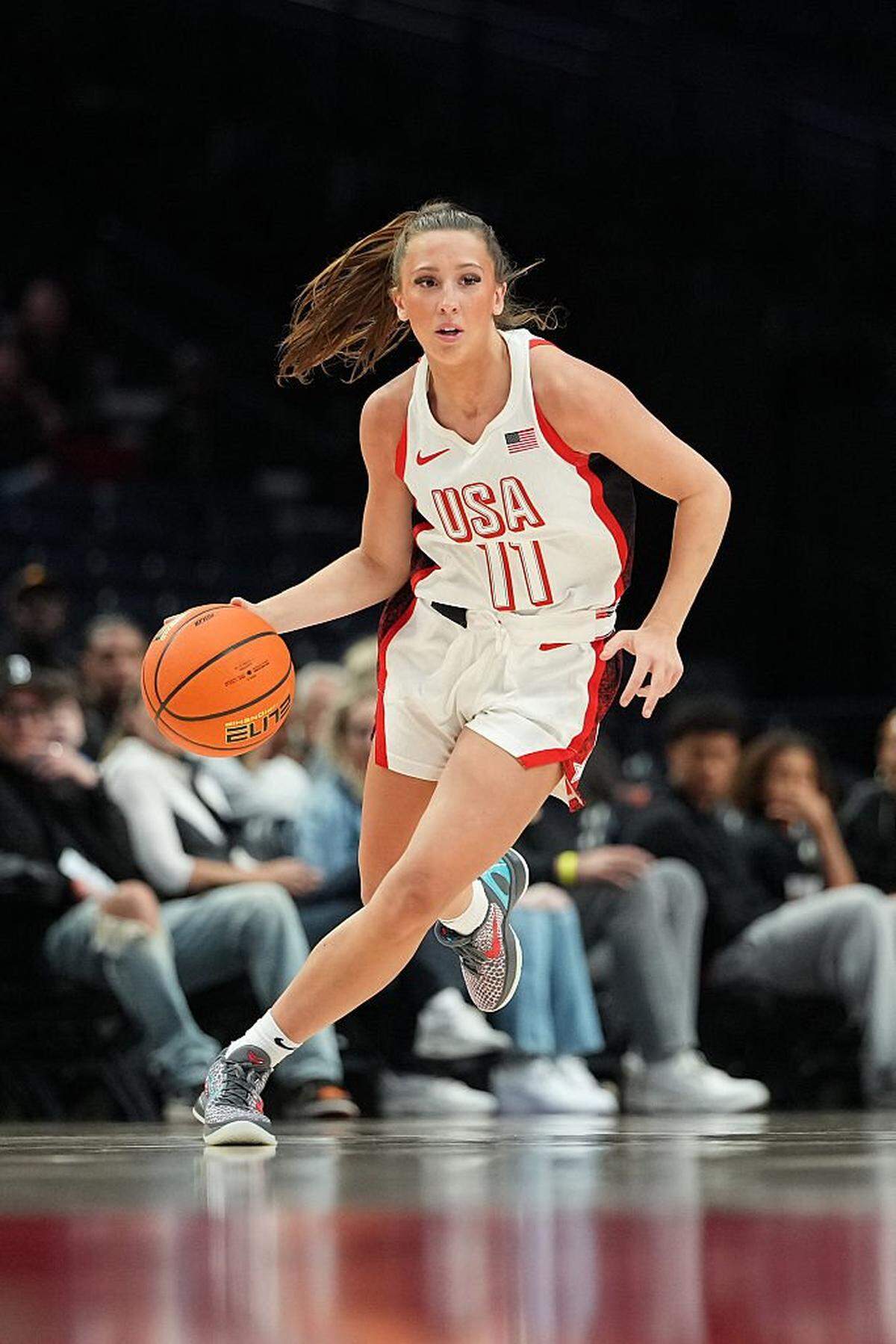 PORTLAND, OREGON - APRIL 11: Maddyn Greenway #11 of the Team USA dribbles the ball during the second half against Team World at Moda Center on April 11, 2026 in Portland, Oregon. (Photo by Soobum Im/Getty Images)