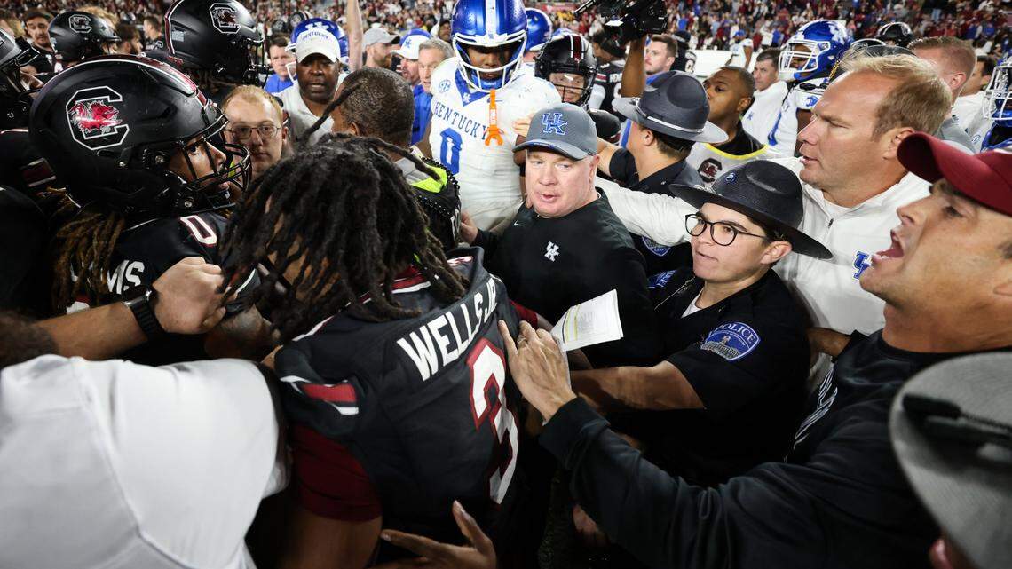 Their controversy behind them, Mark Stoops and Shane Beamer have much in common