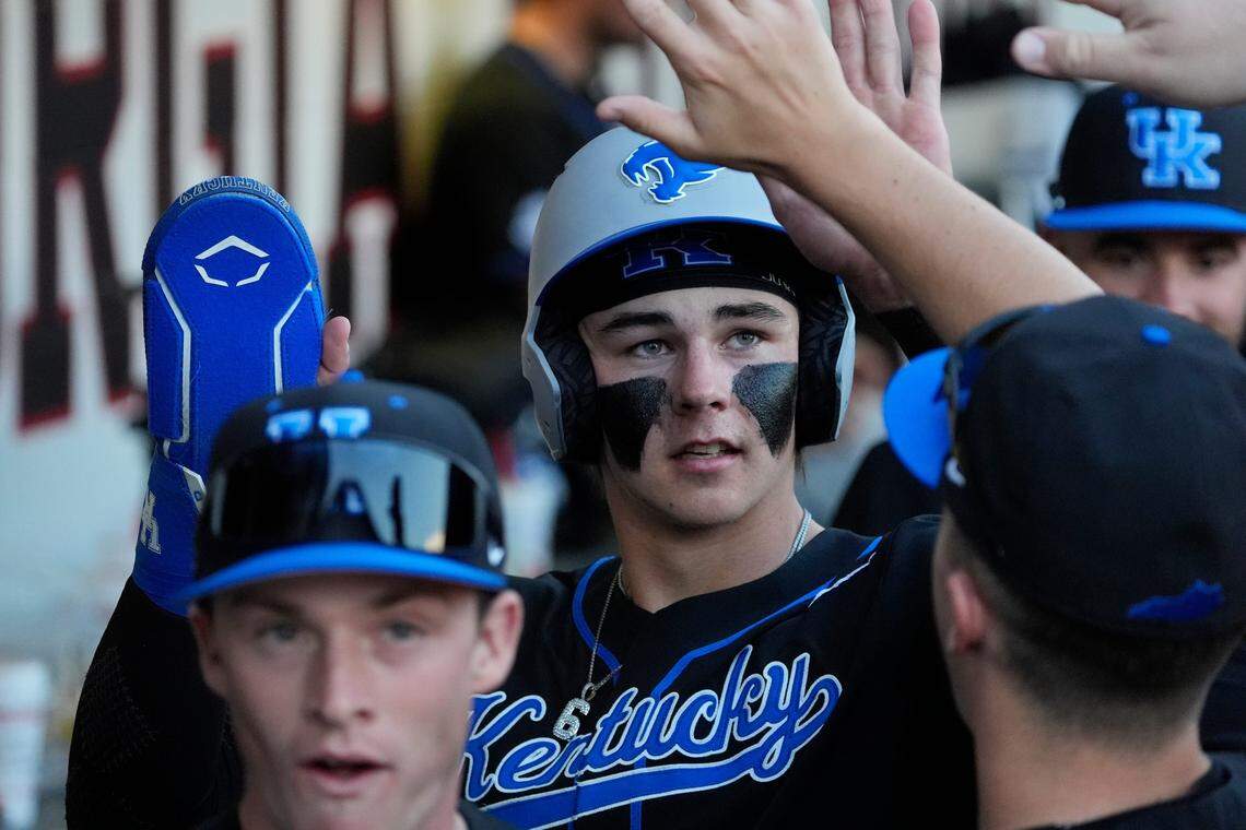 Kentucky's Tyler Bell (6) celebrates after scoring a run during a NCAA baseball game against Georgia on March 14, 2025.