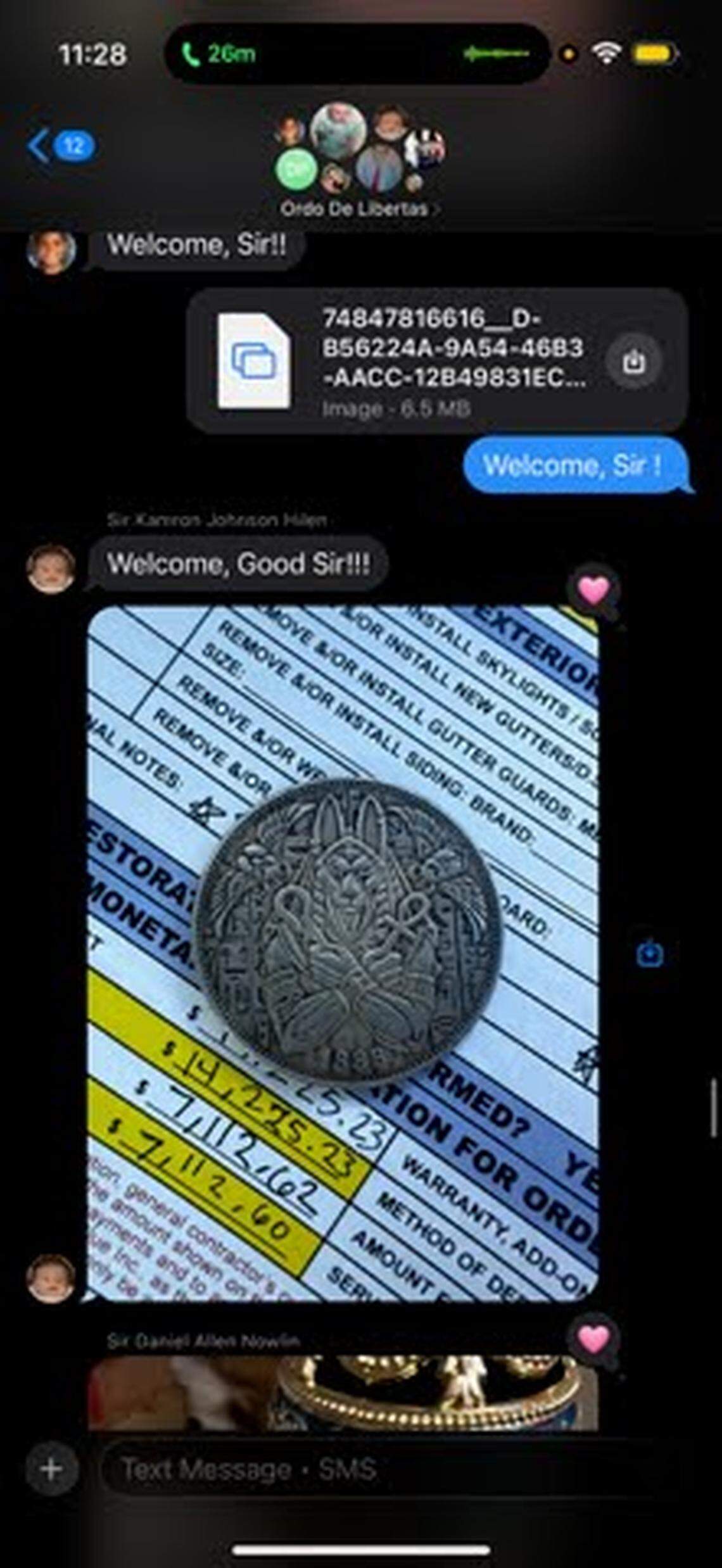 In response to a text from “Dr.” Brad Pagel to welcome a new member to “the order,” Lexington Blue employees texted back photos of their coins.