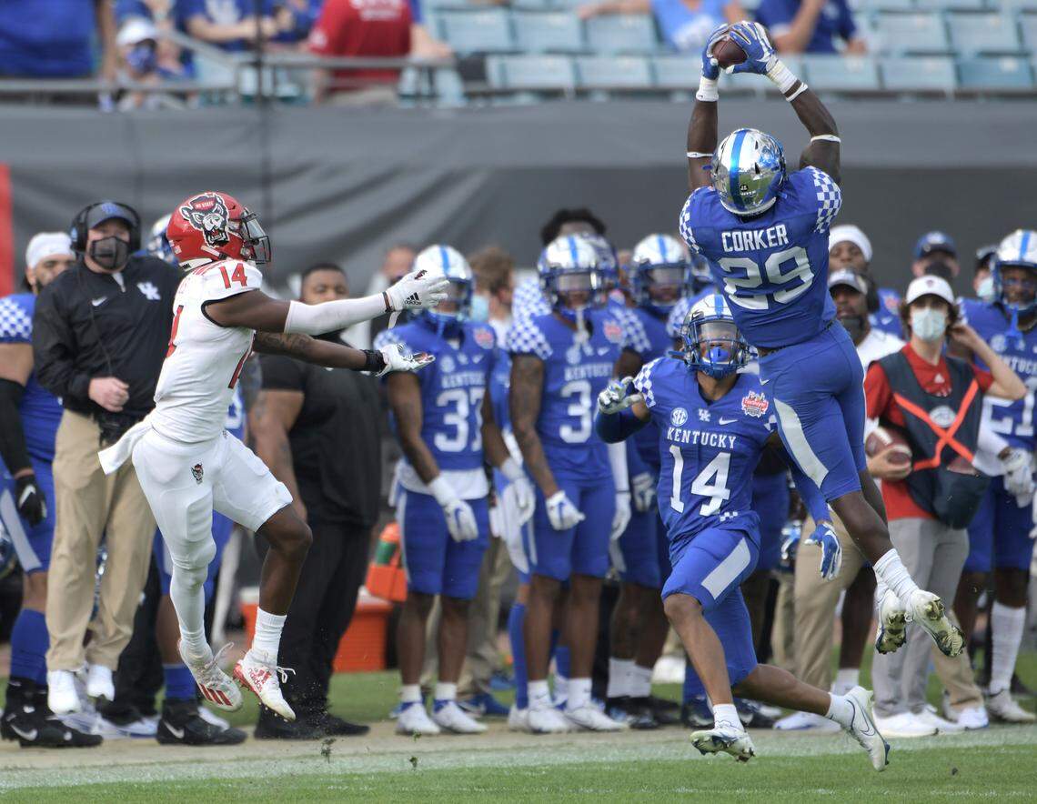 Kentucky free safety Yusuf Corker (29) intercepted a fourth-quarter pass in UK’s 23-21 upset of No. 23 North Carolina State in last season’s TaxSlayer Gator Bowl.