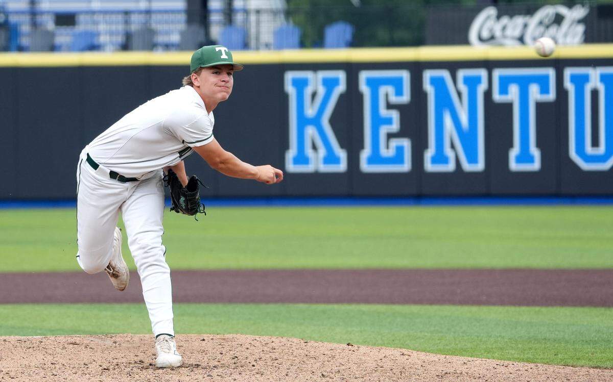 Trinity's Grayson Davis throws the ball home against Boyd County in the KHSAA Boys Semi-Final Baseball Friday evening.June 13, 2025