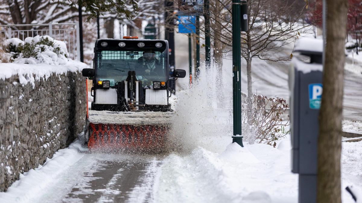 A plow cleared snow off of sidewalks next to UK’s dorms along South Limestone during UK’s move-In day Friday morning, January 7, 2022. Lexington had its first winter storm the previous day, resulting in several inches of snow blanketing the city.