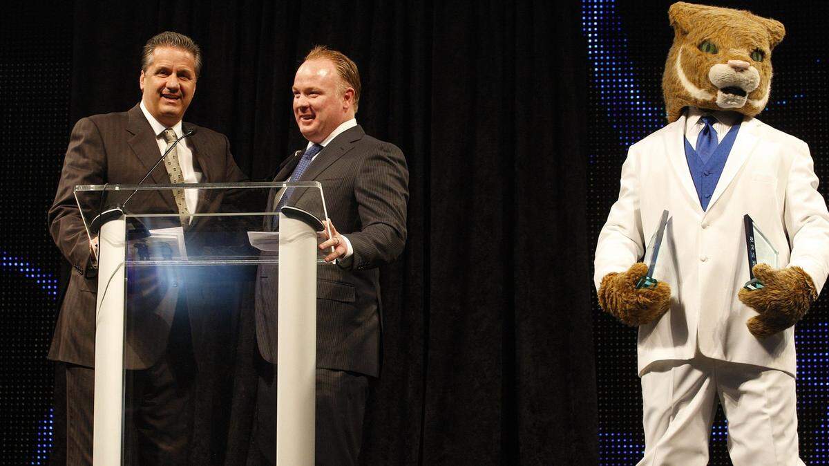 John Calipari and Mark Stoops presented the award for Mr. and Miss Wildcat during the Catspy Awards at Memorial Coliseum in Lexington, Ky., Monday evening, April 22, 2013. Photo by Matt Goins