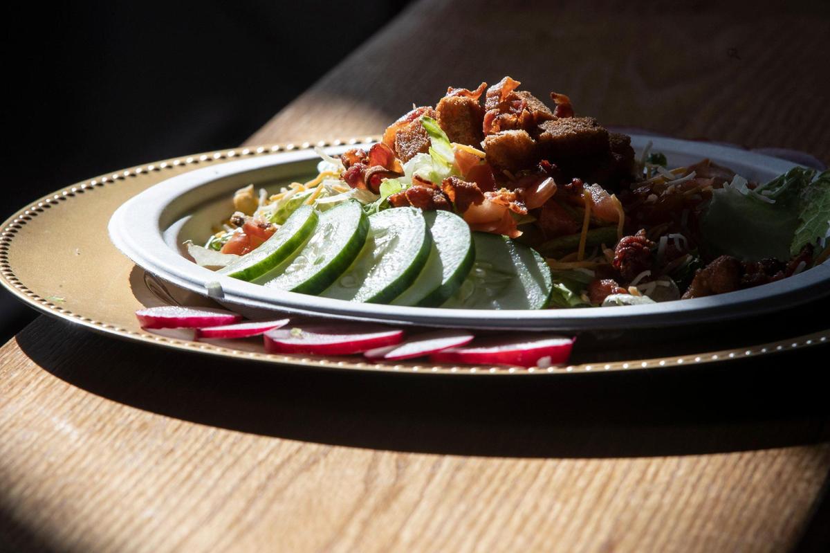 The Mt. Folly Farm salad at Wildcat Willy’s Distillery is garnished with radishes from Mt. Folly Farm, which is just a few miles from the distillery and restaurant.