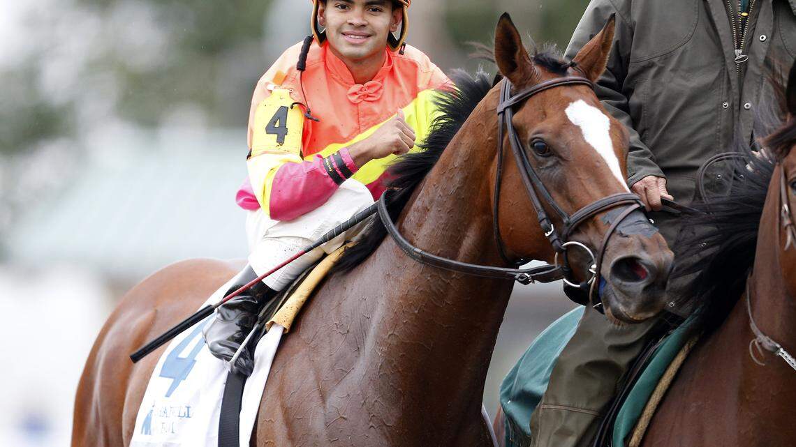 Grand Arch, with jockey Luis Saez, booked a return trip to the Breeders' Cup Mile with his victory in the Shadwell Turf Mile.  