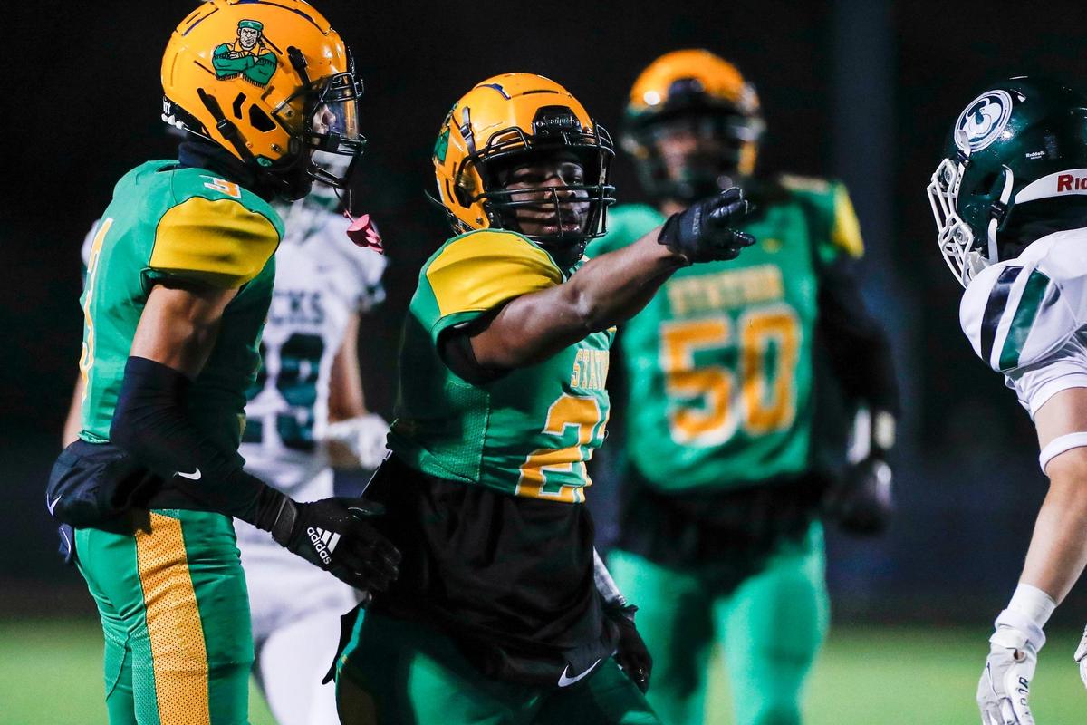 Bryan Station’s Jeremiah Mundy-Lloyd (22) celebrates a first down against Trinity during last week’s Class 6A quarterfinals. Mundy-Lloyd has rushed for 1,018 yards and 17 touchdowns this season.