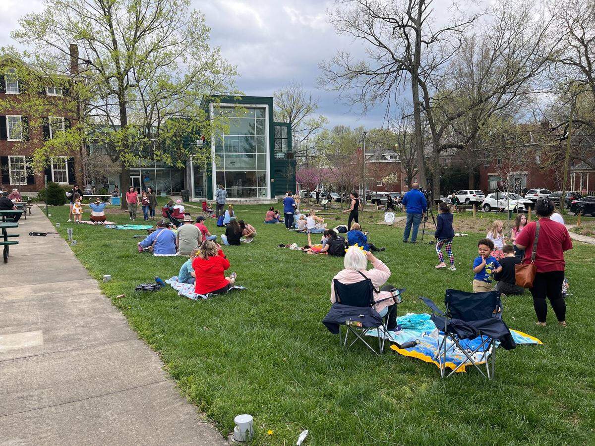 Spectators at Lexington’s Living Arts and Science Center gather to watch the solar eclipse April 8, 2024.