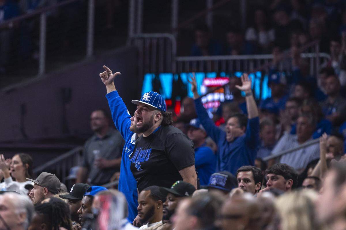 Kentucky fans cheer during Tuesday’s game against Duke in the Champions Classic at State Farm Arena in Atlanta.