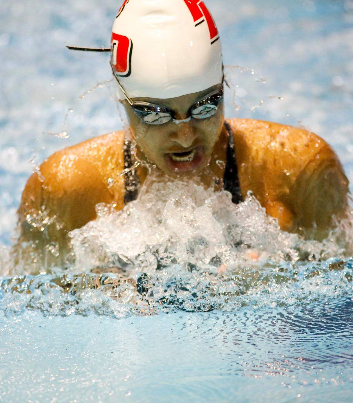 Paul Laurence Dunbar’s Meher Saini competed in the 100-yard breaststroke during the state swimming championships at UK’s Lancaster Aquatic Center.