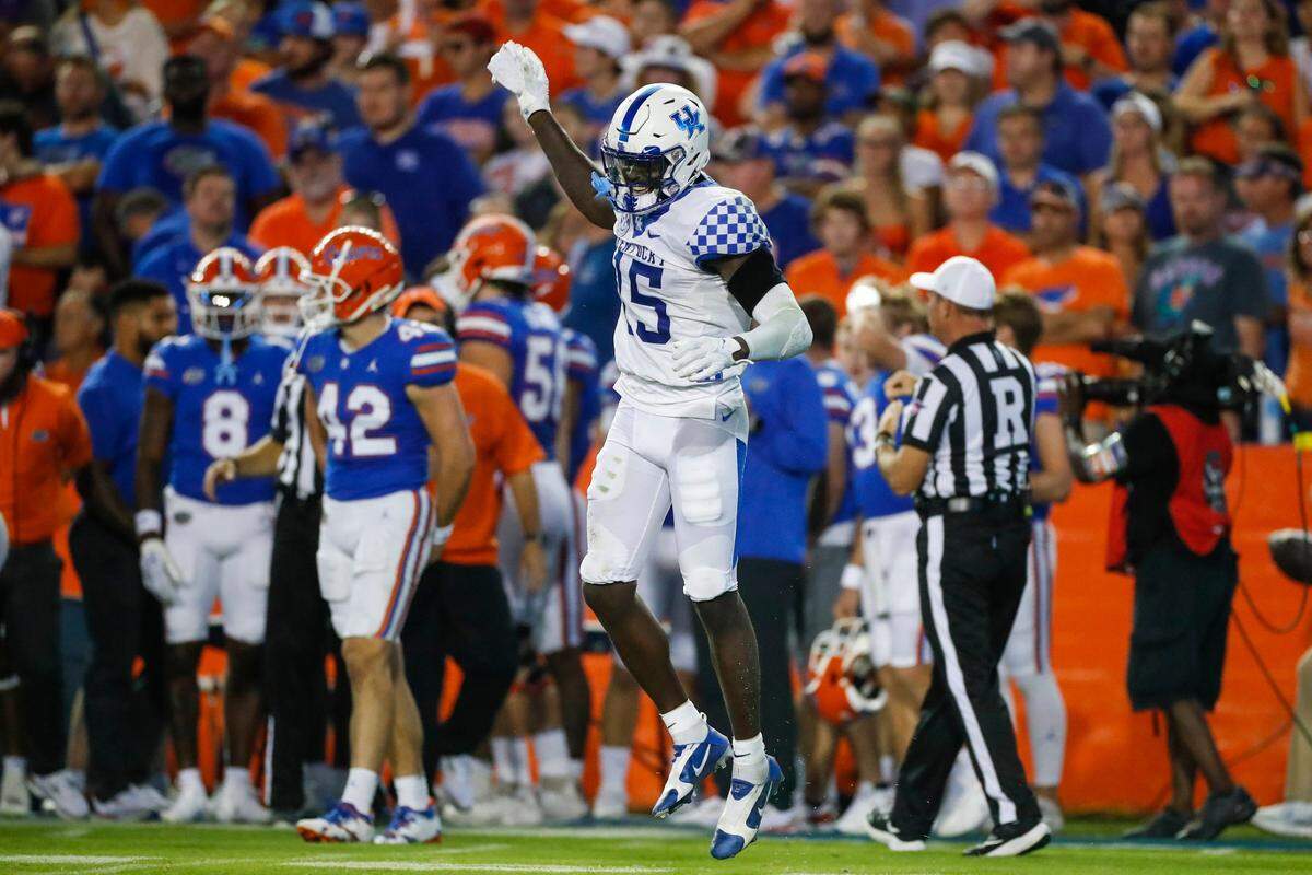 Kentucky Wildcats linebacker Jordan Wright (15) celebrates sacking Florida Gators quarterback Anthony Richardson (15) during the game at Ben Hill Griffin Stadium in Gainesville, Fl., Saturday, September 10, 2022.