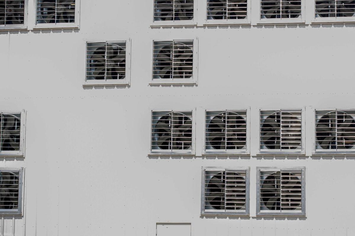 Exhaust fans are used to keep cool bitcoin miners at Blockware Mining’s cryptocurrency mining facility in Paducah, Ky., on Tuesday, March 29, 2022.