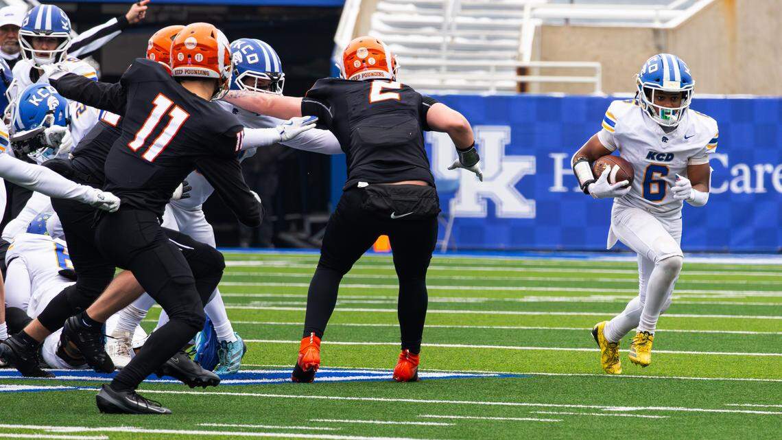 KDC's Deion Davidson (6) rushes for a first down during the 2025 Class A UK HealthCare Sports Medicine State Football Finals championship game between Raceland and Kentucky Country Day at Kroger Field on Dec. 5, 2025, in Lexington, Ky.